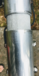 Greyline feedpoint detail on an HF vertical antenna -- where the current choke belongs when SWR wanders