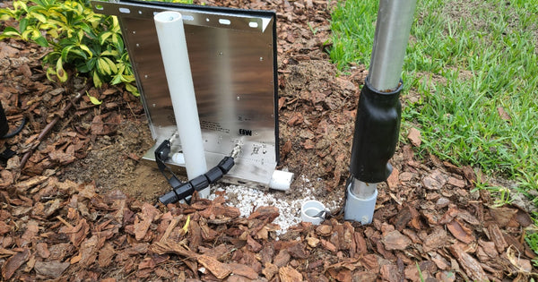 LDG RT-100 remote antenna tuner installed at the base of a Greyline stealth HOA flagpole antenna