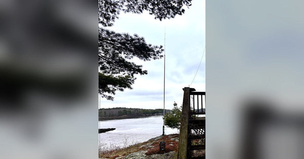 Full-height Greyline vertical antenna at the Maine shoreline - K2DJN saltwater DX site, complete structure tip to base