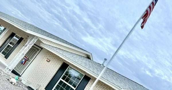 Margie KK7MGK's Greyline DX Flagpole flying the American flag in Sun City, Arizona