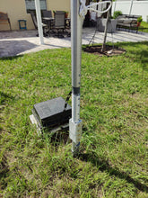 Load image into Gallery viewer, KC4ES: XL Tilt-Up Base on a legacy 2.25-inch 28-foot Greyline flagpole — base, pivot, and remote tuner at the feedpoint